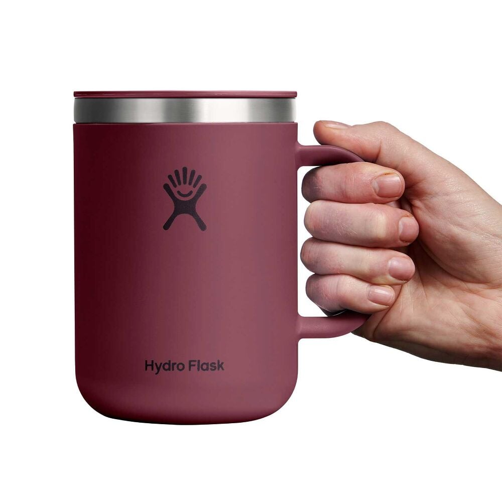 Matte maroon Hydro Flask insulated mug with handle, matching lid, stainless steel band at top edge, small sipping opening, and Hydro Flask logo on front.