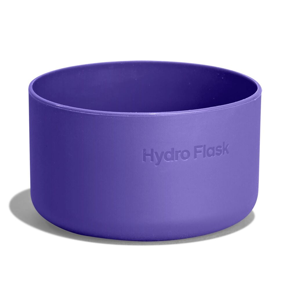 Purple Hydro Flask silicone cup or sleeve with smooth matte finish, straight sides, rounded rim, and "Hydro Flask" embossed on the exterior.