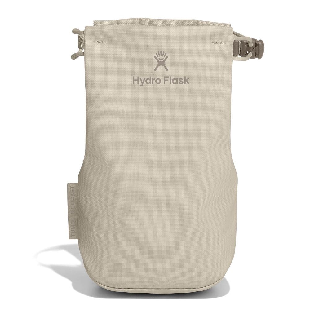 Beige Hydro Flask "Tumbler Pocket" pouch with soft structured shape, rounded bottom, buckle strap attachment on upper right, and Hydro Flask logo on front.